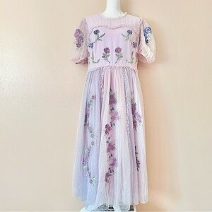 Ivy City Co Enchanted Purple Ruffle Embroidered Floral Puff Sleeve Tulle Dress.